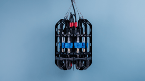 Ascension automated microplastics depth sampler is featured infront of a blue backdrop