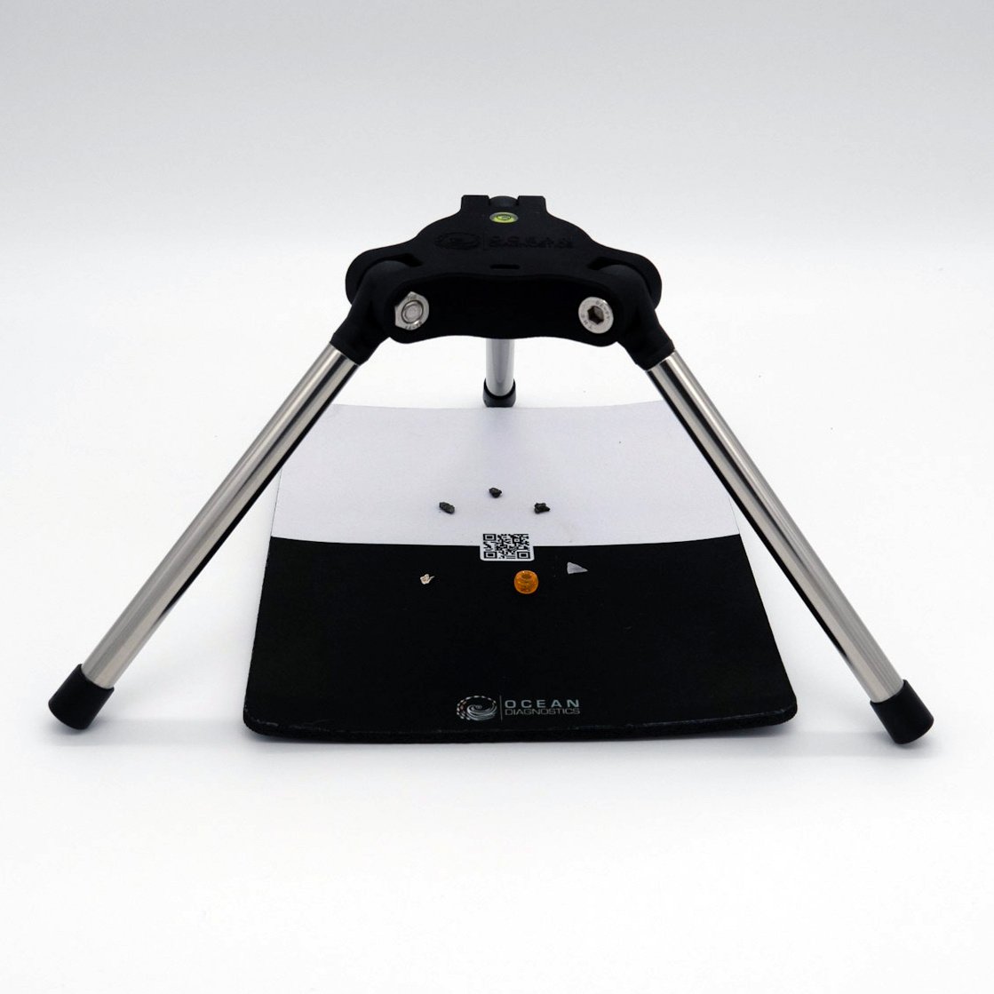Saturna imaging system sits overtop of a background sheet with coloured microplastics ready for analysis