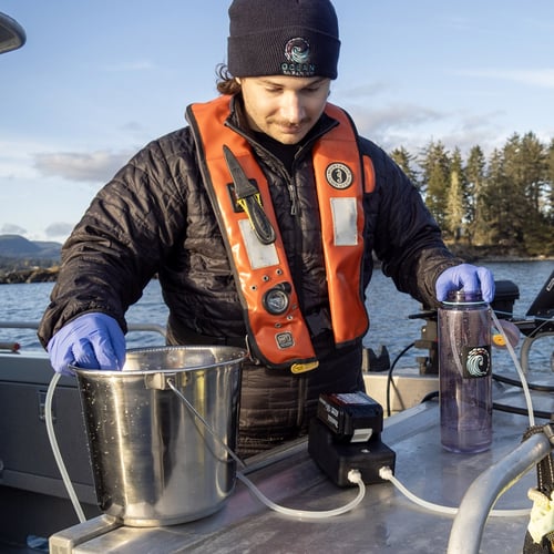 eDNA Surface Sampler aboard a small boat in the Pacific Ocean. eDNA Surface Sampler aboard a small boat in the Pacific Ocean.